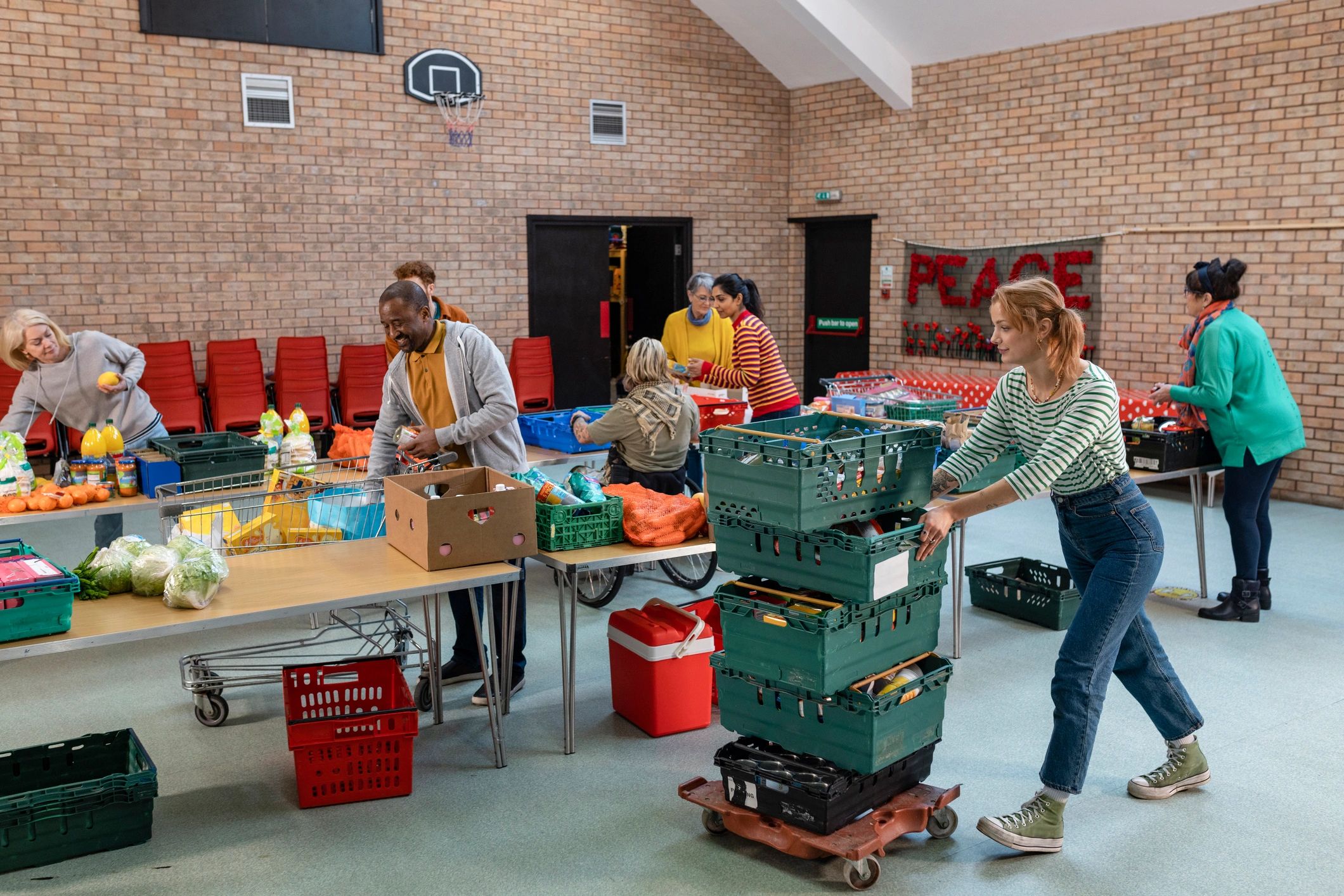 Volunteers organizing food donations together
